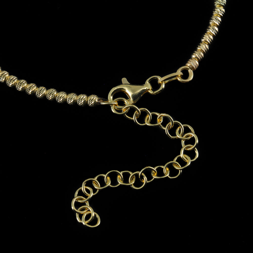 Small and gold plated sparkling pendant with chain