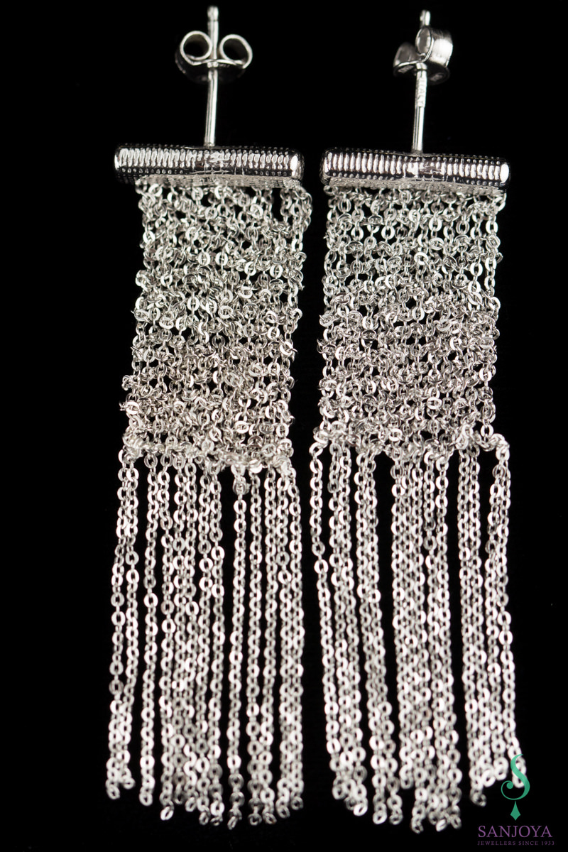 Silver earrings of several short chains. narrow version